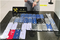 海關(guān)查獲2人身纏74臺iPhone入境：全是“洋垃圾”